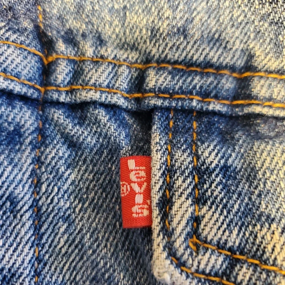 Vintage Levis Flannel Lined Denim Trucker Jacket Made in USA Blue Plaid 70427